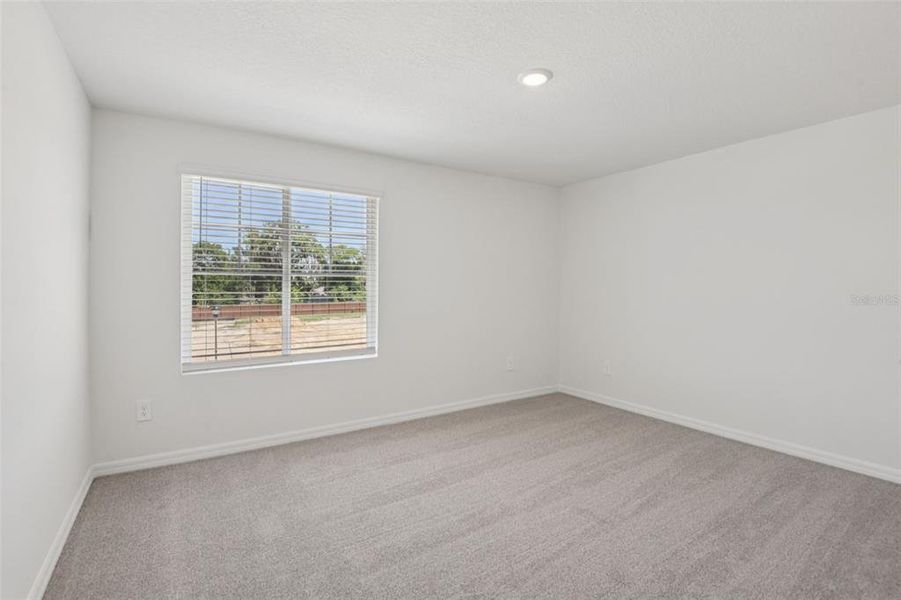 Spacious, unfurnished interior of a new home in Hilltop Vistas, Dade City (Image 28).