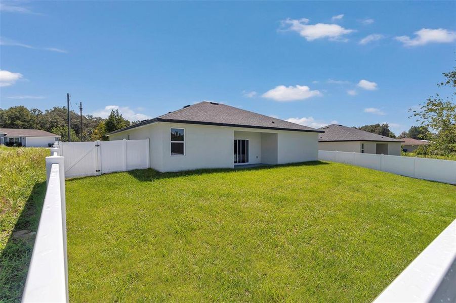 Front exterior of a new home in , Citrus Springs, FL, highlighting curb appeal (Image 23).