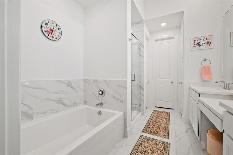 Beautiful soaking tub with separate shower in the primary bath Beautiful soaking tub with separate shower in the primary bath