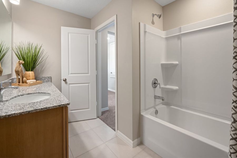 Representative furnished interior of a home built from the 1852 Modeled by KB Home in Canoe Creek Reserve I, St. Cloud (Image 15).