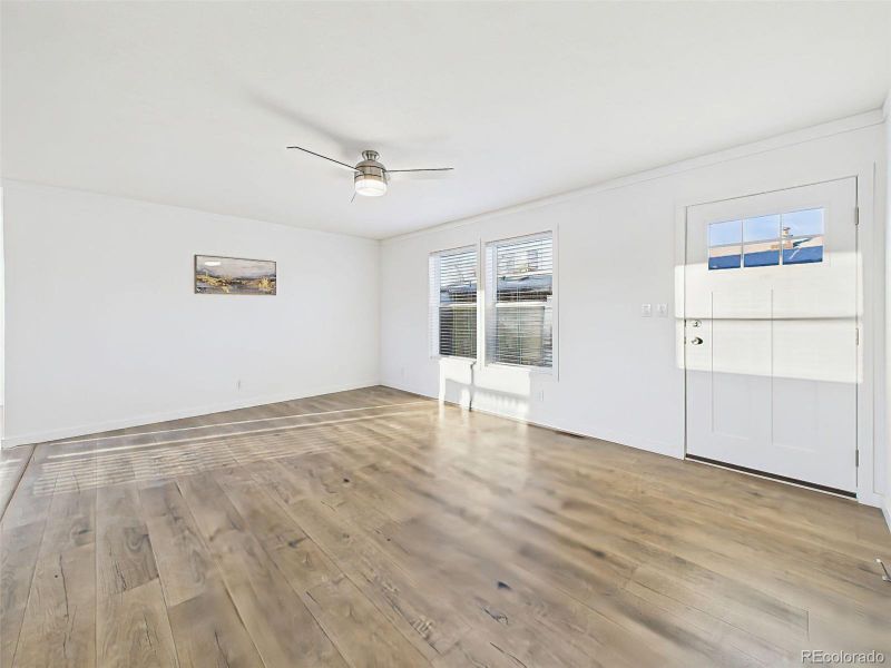 Family Room Open and flexible, this front living space offers great natural light and entryway access.