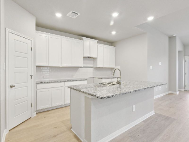 Kitchen in the San Jacinto floorplan at a Meritage Homes community.