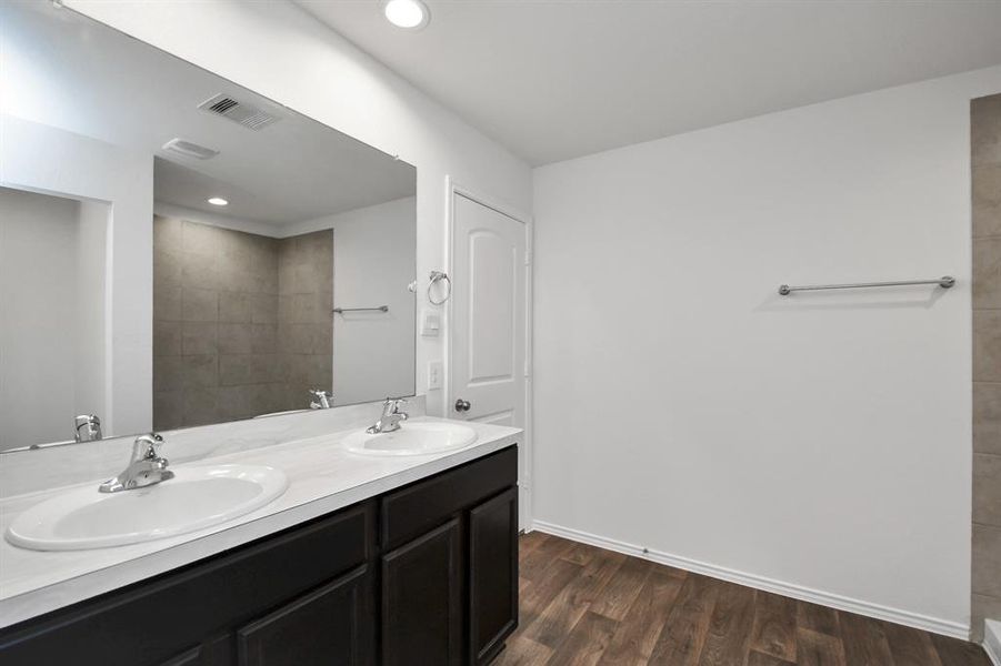 Ensuite bathroom in the primary bedroom.