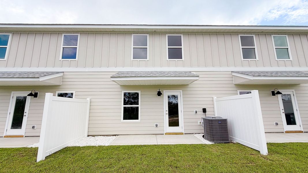 Exterior details and patio area of a home in WindMark Beach, Port Saint Joe (Image 3).