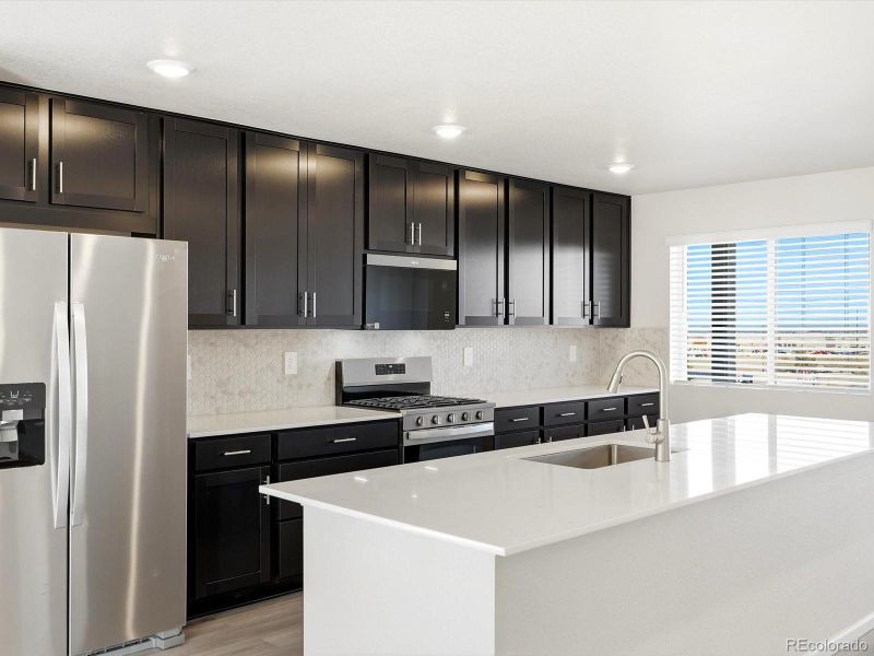 Furnished interior view inside a new home in Three Hills, Morrison (Image 9).