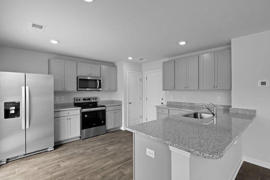 Furnished interior view inside a new home in Center Pointe, Santee (Image 6). Furnished interior view inside a new home in Center Pointe, Santee (Image 6).