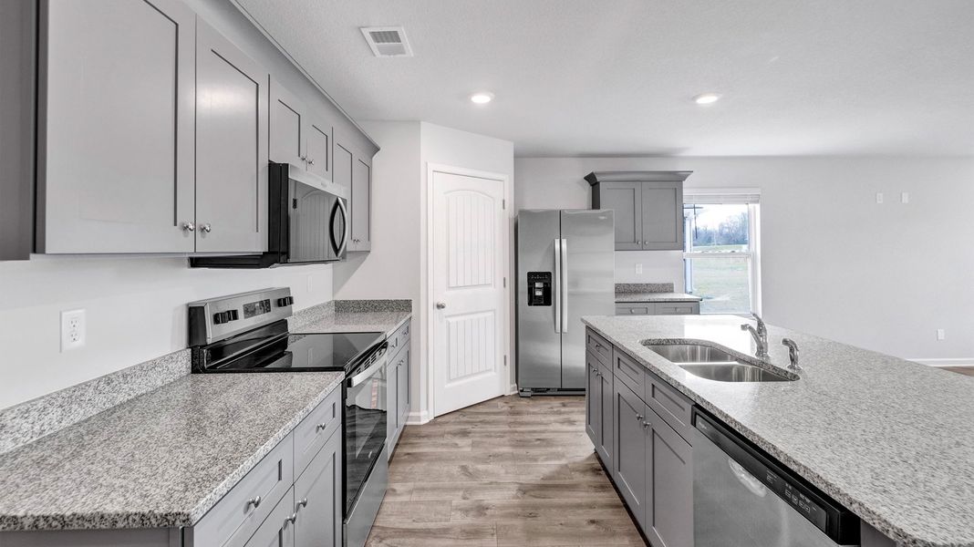 Furnished interior view inside a new home in Huntington Estates, Millington (Image 6).