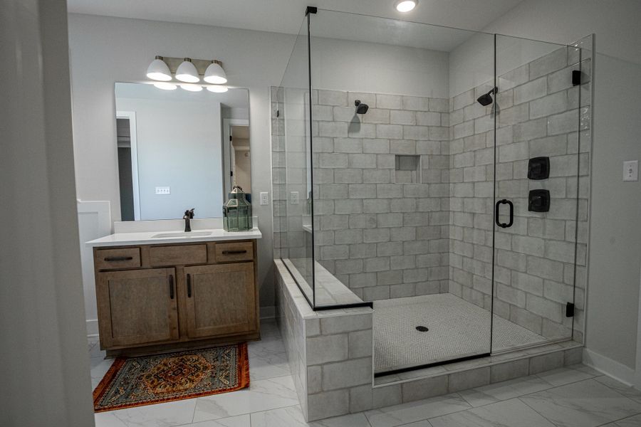 Representative furnished interior of a home built from the Willow by Grant & Co in Manor at Hall Creek, Arlington (Image 128).