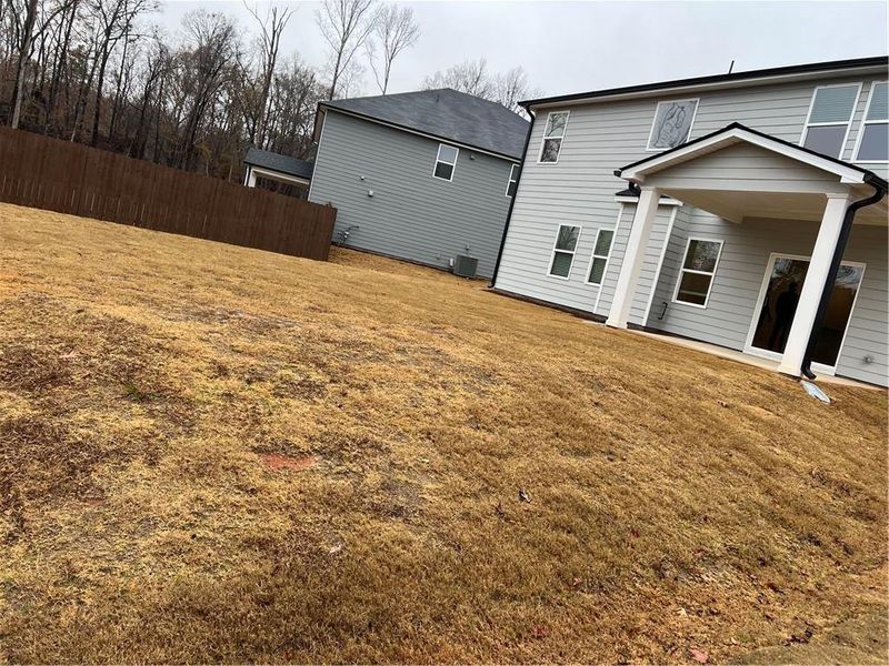 Exterior details and patio area of a home in Union Grove, Braselton (Image 16).