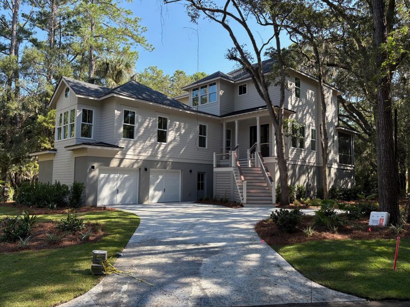 Front exterior of a new home in , Seabrook Island, SC, highlighting curb appeal (Image 25).