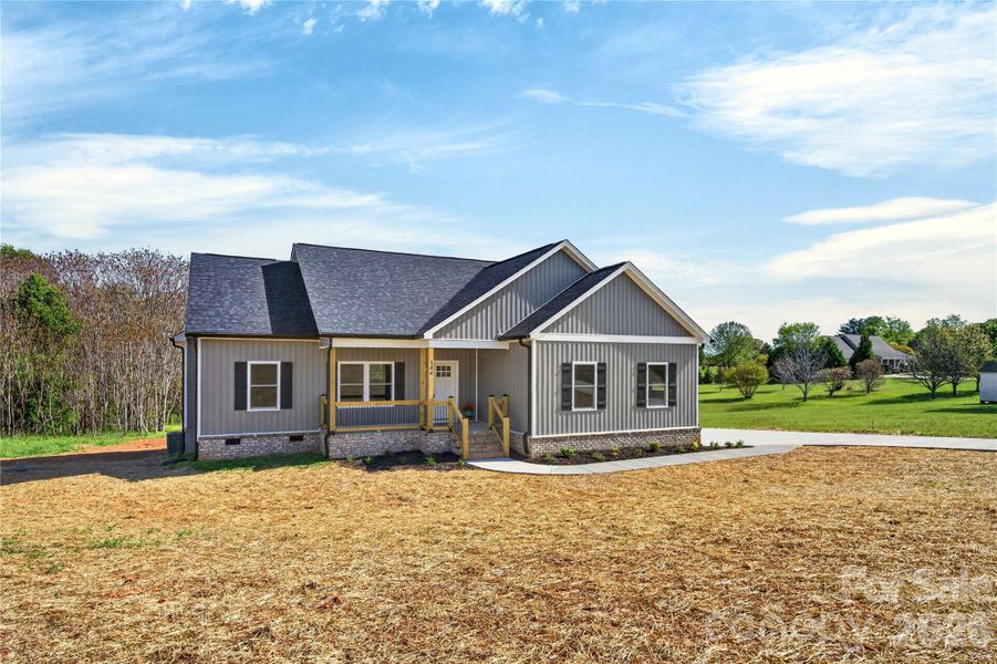 Front exterior of a new home in , Harmony, NC, highlighting curb appeal (Image 27). Front exterior of a new home in , Harmony, NC, highlighting curb appeal (Image 27).