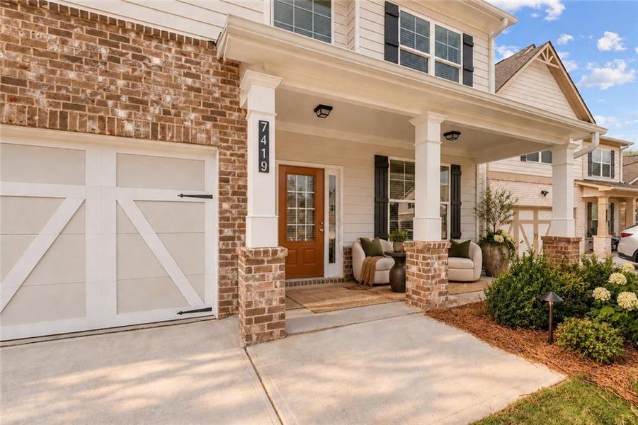 Exterior details and patio area of a home in Clark Farms, Flowery Branch (Image 22).