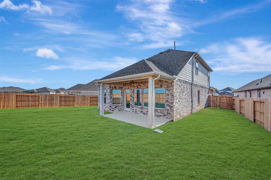 Exterior details and patio area of a home in Marvida, Cypress (Image 23).