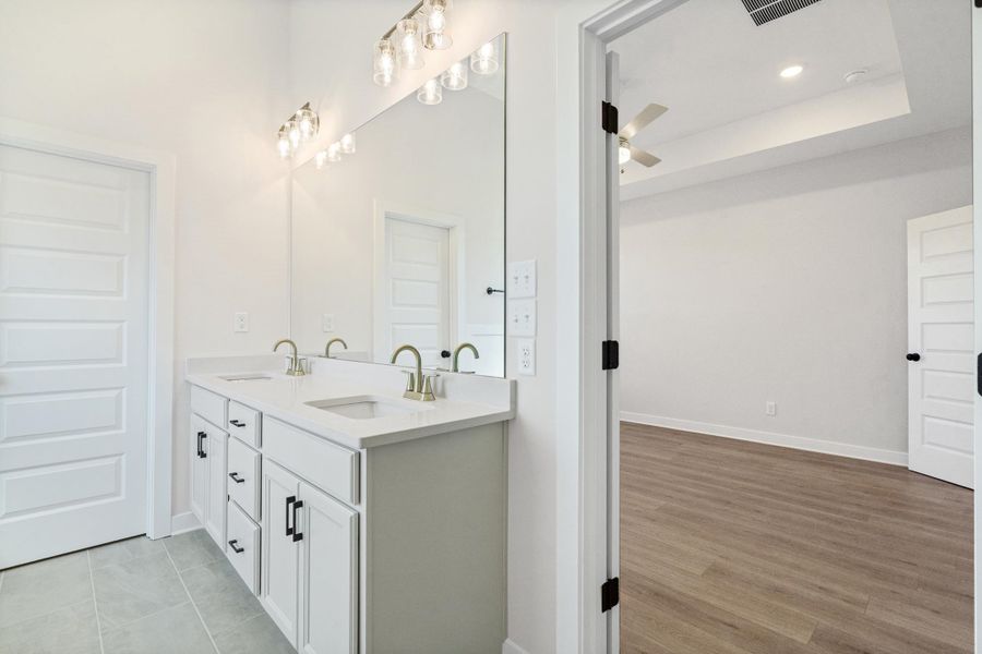 Furnished interior view inside a new home in Villages of Green Meadows, Munford (Image 9).