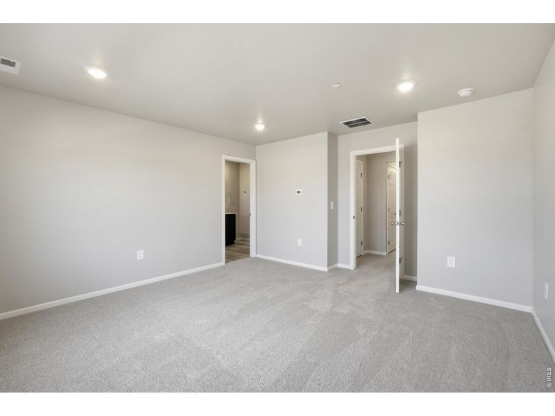 Spacious, unfurnished interior of a new home in Poudre Heights: The Meadow Collection, Windsor (Image 17).