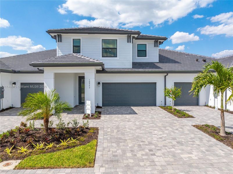 Front exterior of a new home in , Fort Myers, FL, highlighting curb appeal (Image 10).