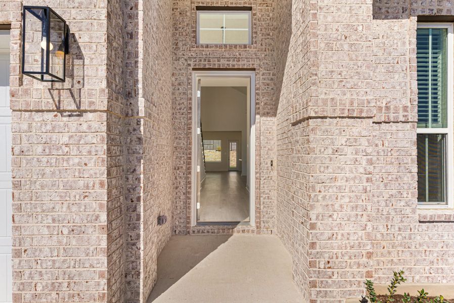 Exterior details and patio area of a home in The Grove at Blackhawk, Pflugerville (Image 2). Exterior details and patio area of a home in The Grove at Blackhawk, Pflugerville (Image 2).