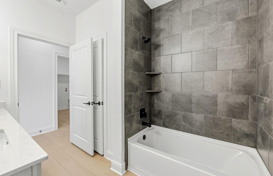 Furnished interior view inside a new home in West Cypress Hills, Spicewood (Image 7).