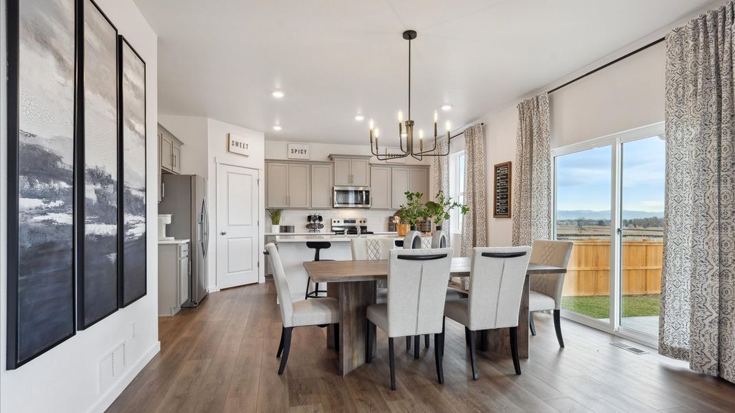 Representative furnished interior of a home built from the Holcombe by D.R. Horton in Sky Ranch, Watkins (Image 9).