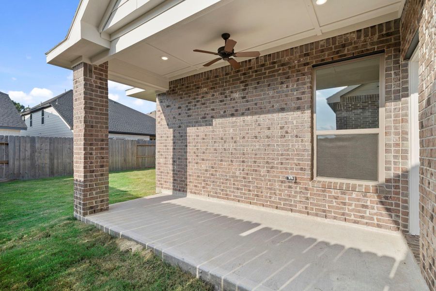 Exterior details and patio area of a home in The Trails 40', New Caney (Image 4).