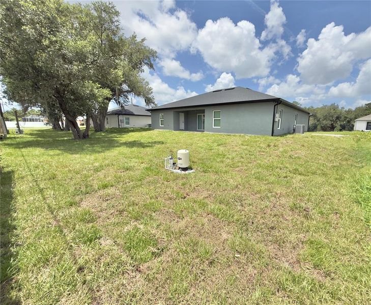 Front exterior of a new home in , Port Charlotte, FL, highlighting curb appeal (Image 25).