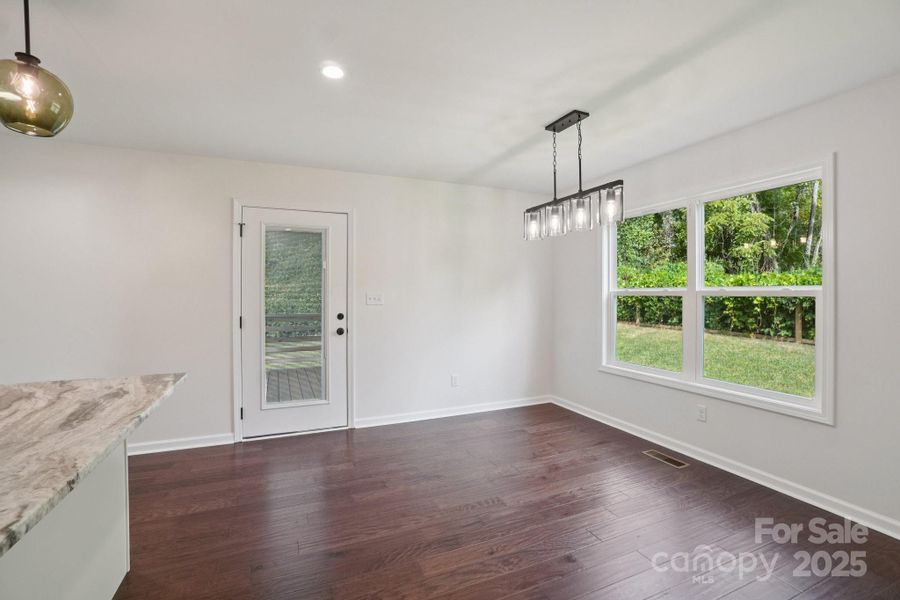 Dining area with access to covered deck