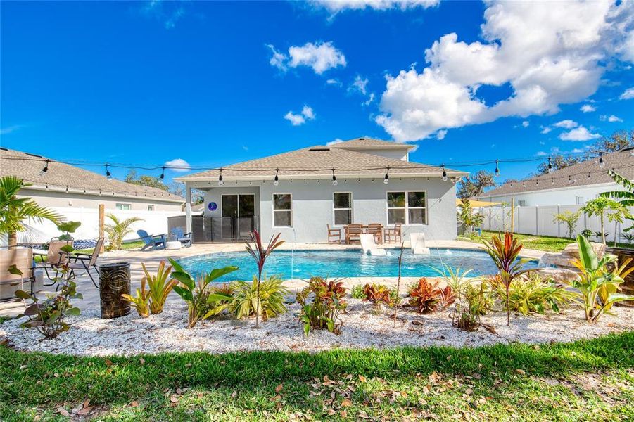 Exterior details and patio area of a home in , New Smyrna Beach (Image 29).