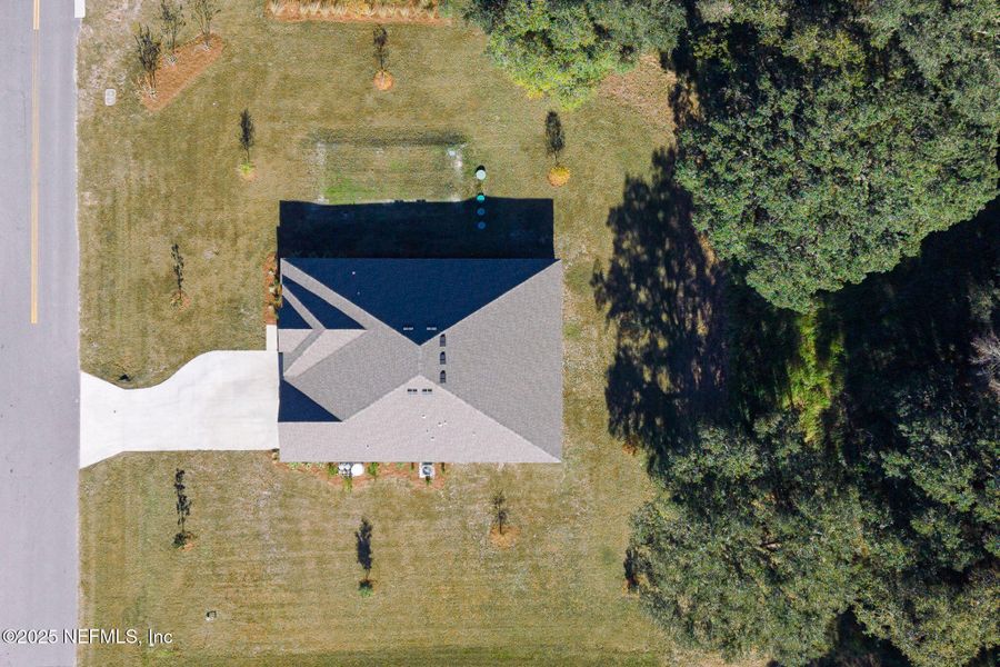 Front exterior of a new home in , Callahan, FL, highlighting curb appeal (Image 24). Front exterior of a new home in , Callahan, FL, highlighting curb appeal (Image 24).