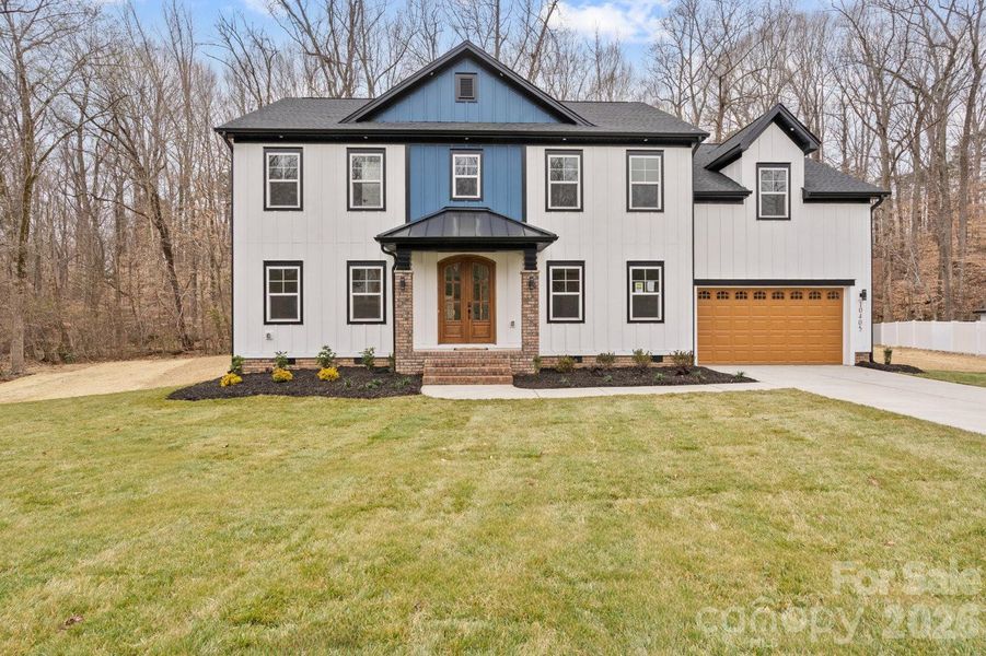 Front exterior of a new home in , Mint Hill, NC, highlighting curb appeal (Image 20).