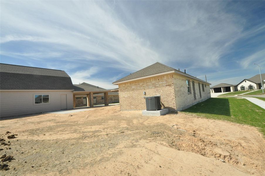 Exterior details and patio area of a home in , League City (Image 21).