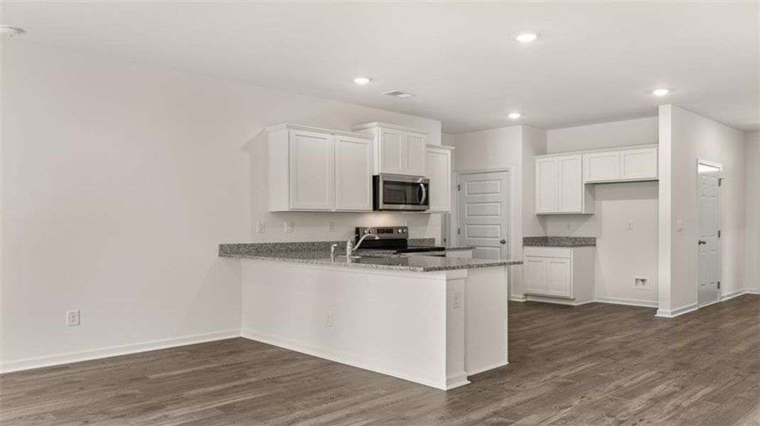 Furnished interior view inside a new home in Champion's Run, Lithonia (Image 12).