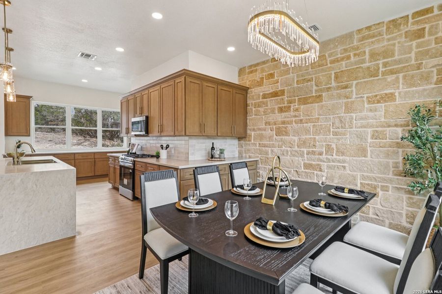 Furnished interior view inside a new home in , Fischer (Image 6).