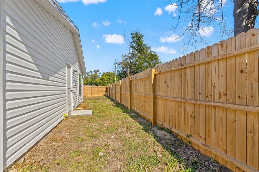 Exterior details and patio area of a home in , Spring Hill (Image 3).