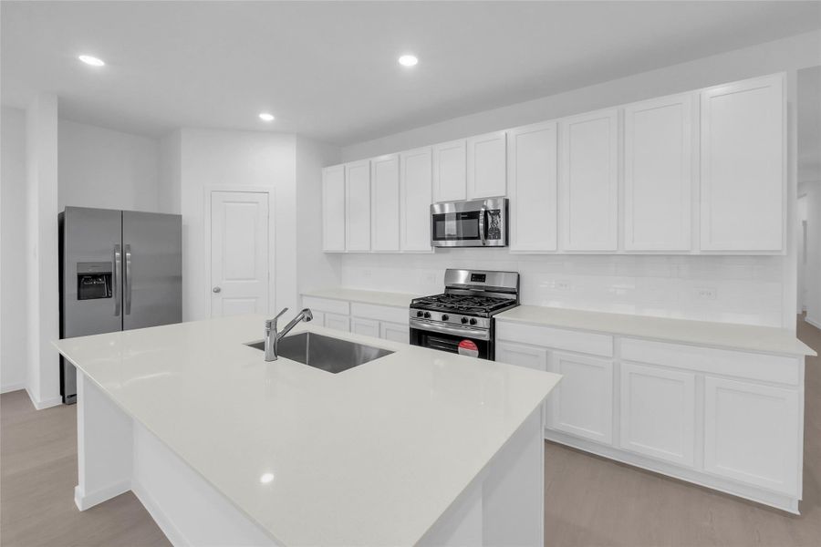 **Photos are representative of the actual floor plan. This is not the actual homesite.**