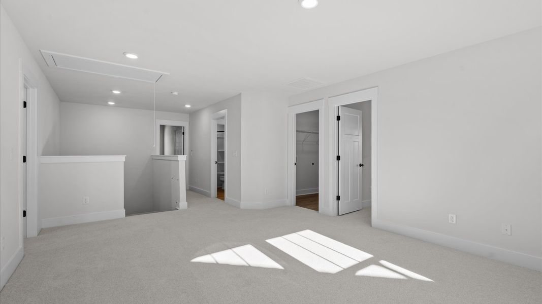 Accomplished upstairs loft with plush carpet and versatile functionality Accomplished upstairs loft with plush carpet and versatile functionality