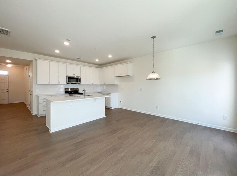 Spacious, unfurnished interior of a new home in Bellevue Townhomes, Greenville (Image 14).
