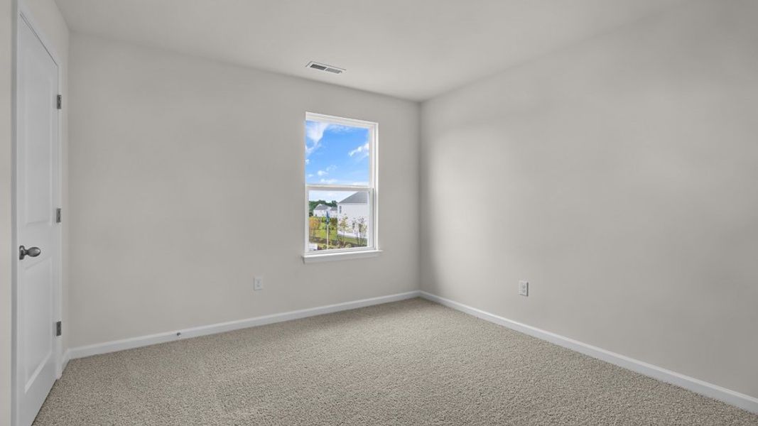 Spacious, unfurnished interior of a new home in The Reserve at Prestleigh, Wake Forest (Image 19).