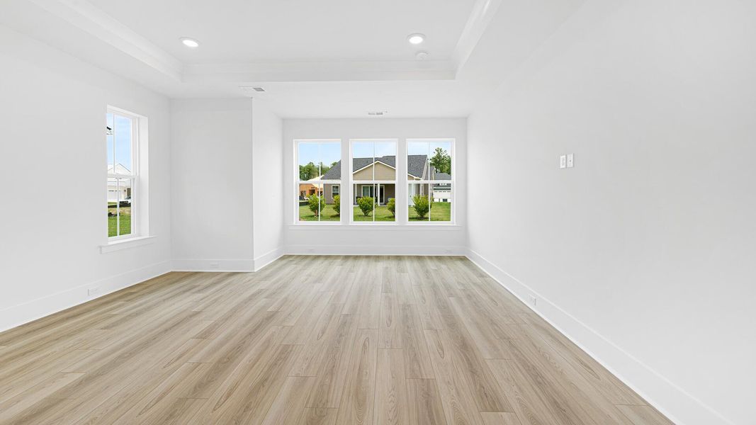 Spacious, unfurnished interior of a new home in Summerwind Crossing at Lakes of Cane Bay, Summerville (Image 6).