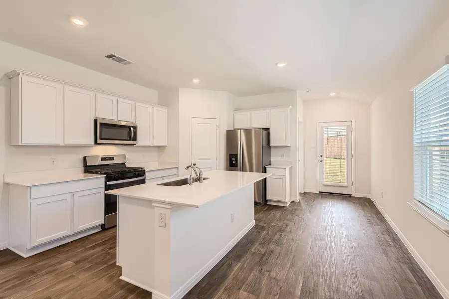 Furnished interior view inside a new home in , Kyle (Image 4).