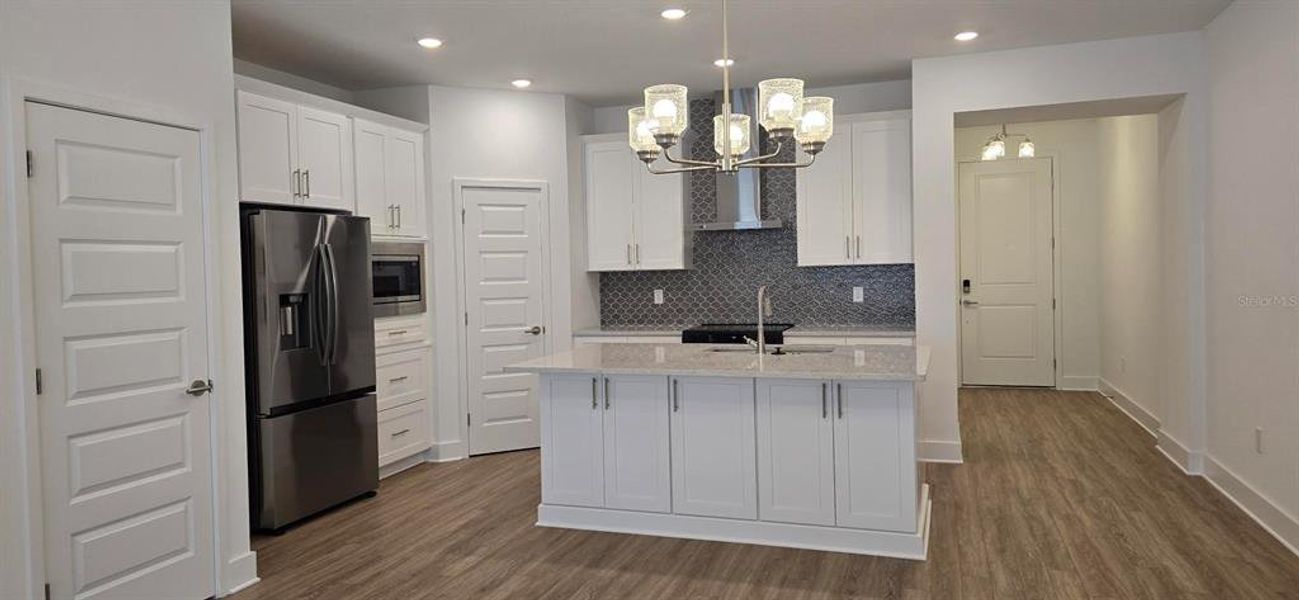 Furnished interior view inside a new home in , Winter Garden (Image 5).