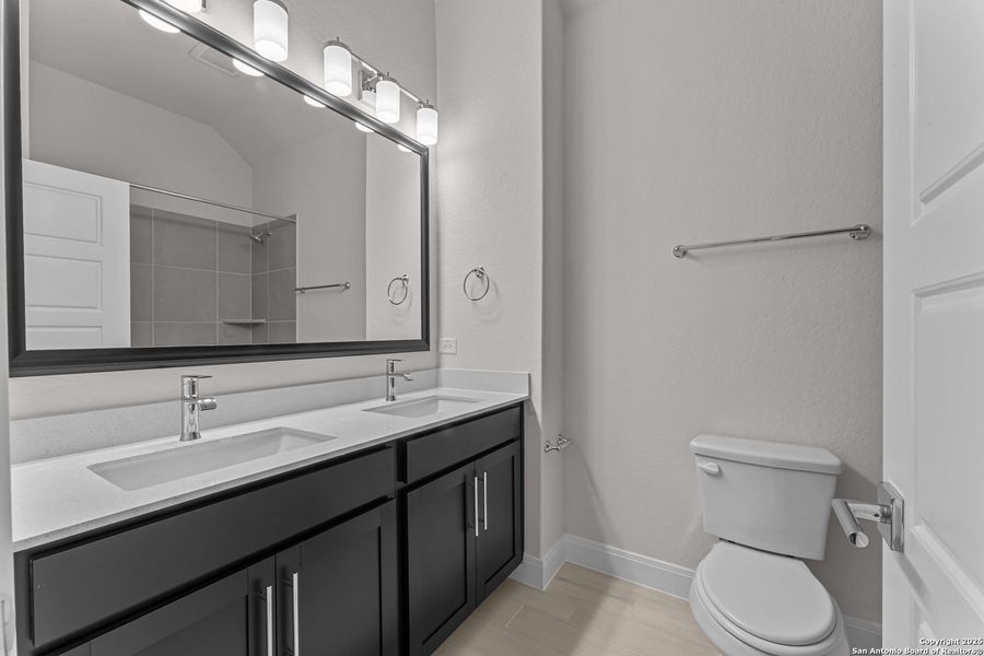 Furnished interior view inside a new home in Ladera - High Point 45', San Antonio (Image 4).