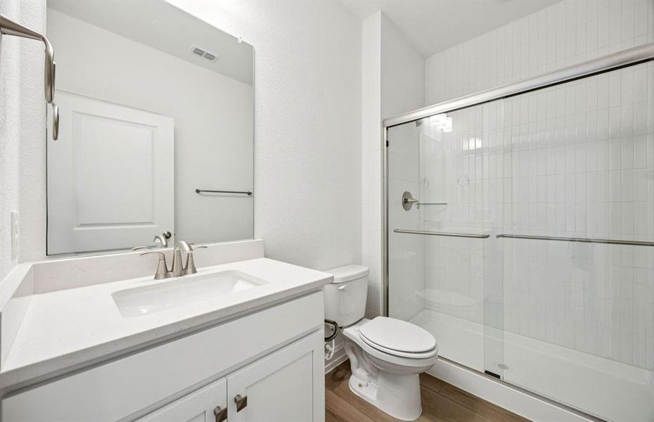 Spacious secondary bathroom with premium finishes
