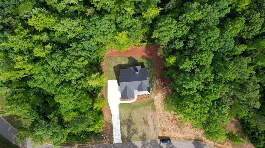 Front exterior of a new home in , Monticello, GA, highlighting curb appeal (Image 28).