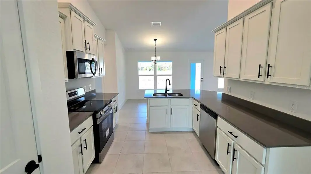 Furnished interior view inside a new home in North Port, North Port (Image 3).