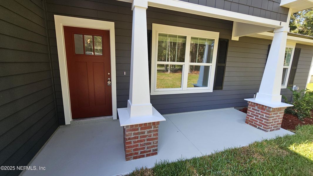 Front exterior of a new home in , Jacksonville, FL, highlighting curb appeal (Image 2).