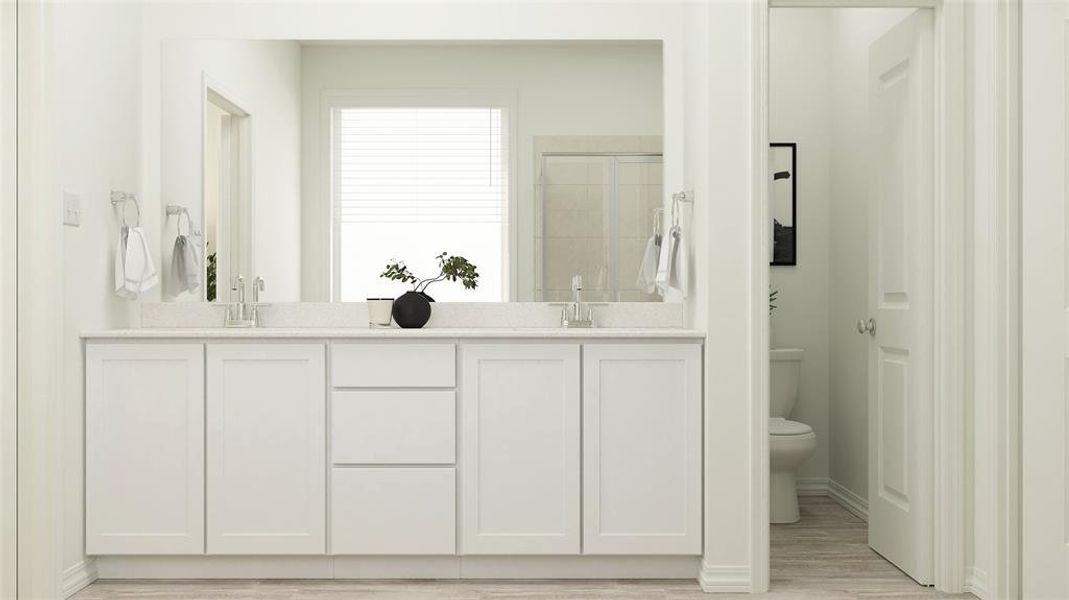 Bathroom featuring walk in shower, hardwood / wood-style flooring, vanity, and toilet