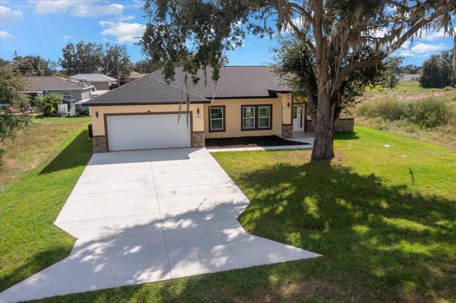 Front exterior of a new home in , Dunnellon, FL, highlighting curb appeal (Image 23). Front exterior of a new home in , Dunnellon, FL, highlighting curb appeal (Image 23).