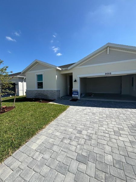 Exterior details and patio area of a home in Azalea, Port St. Lucie (Image 4).