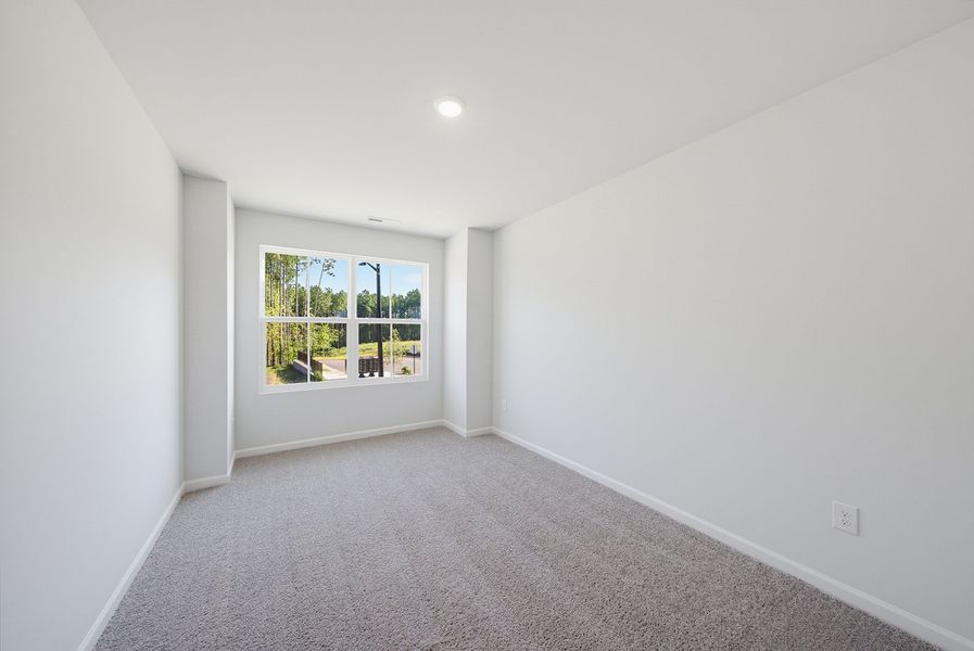 Spacious, unfurnished interior of a new home in Sweetbrier, Durham (Image 25).