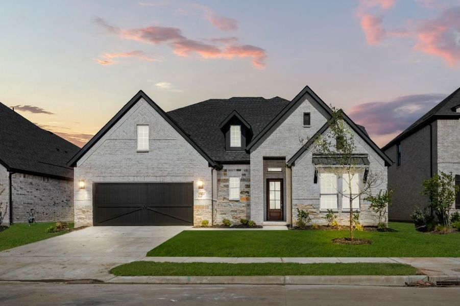 Front exterior of a home in the Cambridge Crossing community, located in Celina, TX (Image 17).